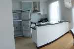 full picture of living room, dining and kitchen